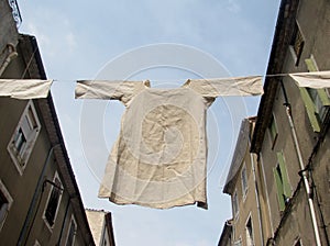 Undergarment shirt hanging on a clothesline