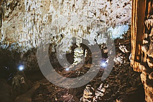 Underground cave, amazing scene , view of stalactites and stalagmite underground , formation inside