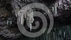 Underground Cave with Stalactite Rock Formations Hanging from Kuza Cave Ceiling
