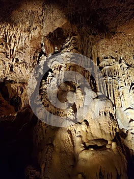Underground cavern with stalagtites