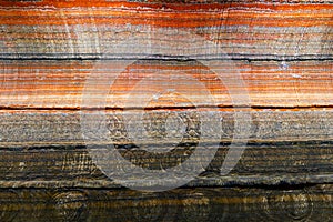 Underground multicolor background fragment with traces of large drilling equipment on wall in potassium and sodium salts