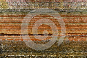 Underground multicolor background fragment with traces of large drilling equipment on wall in potassium and sodium salts