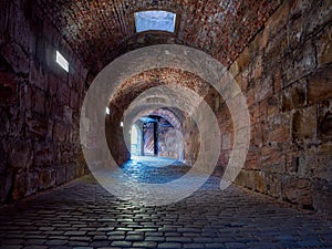 Underground passage under old medieval fortress.