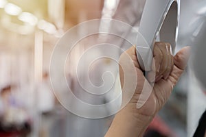 Underground railway system metro, Handle on the ceiling of bus or train on the MRT