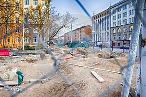 Underground Rennovation Works in City with Protective Fence Wire At Foregound