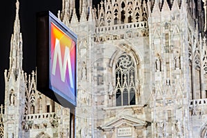 Underground subway metro tube traffic sign with Cathedral on background, in Milan, Lombardy, Italy