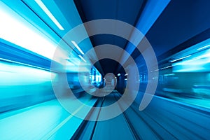 Underground subway tunnel blurred in speed motion