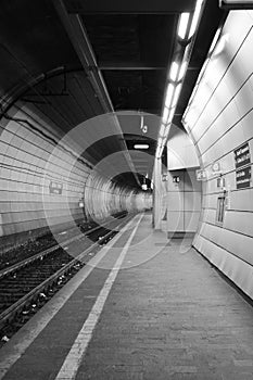 Underground train tunnel in Genoa Italy, photo in black & white..