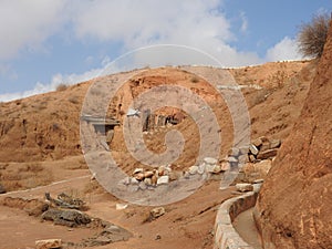 Underground troglodytes caves of the Berbers in the Sahara desert, Matmata, Tunisia, Africa, on a clear day