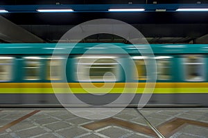 Underground Tube Station with Moving train