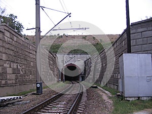 Underground tunnel with railway tracks for a mine in the mining industry