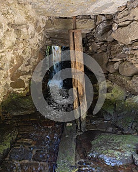 Underground water channel of saw and grinding mill.