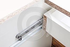 Undermount Drawer Slides - glides closeup detail - Furniture hardware