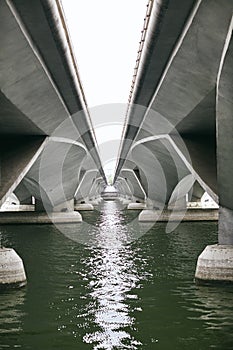 Underneath of the bridges with the light reflection on the water, Around Marina Bay area of Singapore