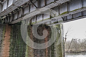 The underside the metal railway bridge over the River Bure in the village of Hoveton and Wroxham