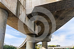 Underside view of raised freeway at an interchange in San Francisco, California