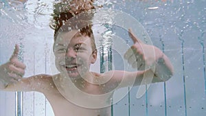 Underwater boy in aquapark