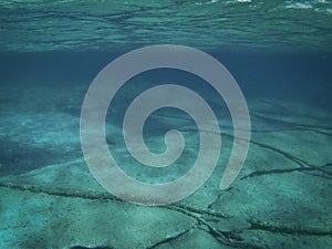 Underwater cables, ocean floor background