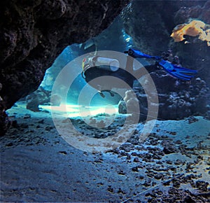 Underwater cave with sunlight and sunbeams