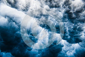Underwater clouds of ocean wave with foam and bubbles. Abstract background with water