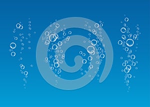 Underwater fizzing air bubbles flow on blue background.