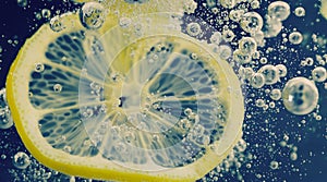 Underwater of freshly squeezed sweetened lemonade cold refreshing drink