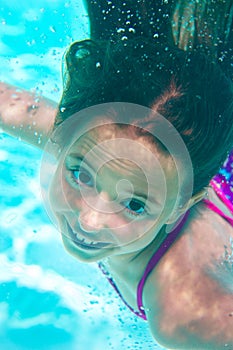 Underwater girl in the pool
