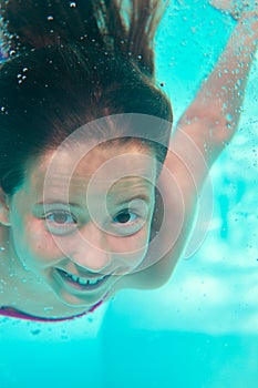 Underwater girl in the pool