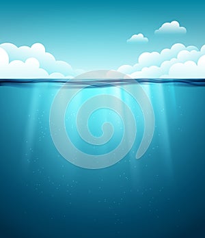 Underwater ocean surface. Blue water background. Clean nature sea underwater backdrop with sky