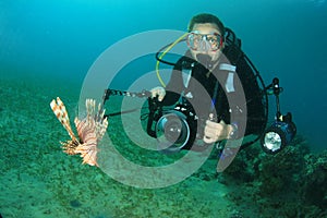 Underwater Photographer and Lionfish