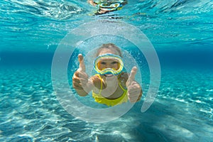 Underwater portrait of child in the sea