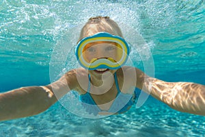 Underwater portrait of child in the sea