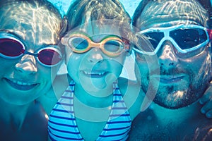 Underwater portrait of family