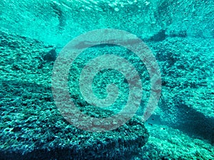 Underwater reflection from stone