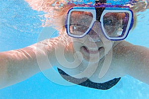 Underwater selfie portrait with scuba mask