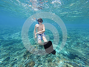 Underwater shoot of a young boy snorkeling