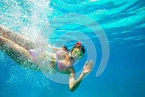 Underwater shoot of a young lady snorkeling