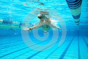 Underwater shooting of a swimmer in a swimming pool