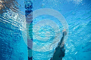 Underwater shooting of a swimmer in a swimming pool