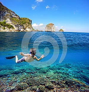 Underwater and surface split view in the tropics