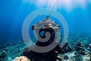 Underwater temple in blue ocean near Amed, Bali. Diving site in Bali