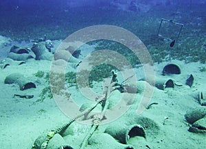 Underwater treasure with amphoras and egyptian cat statue in Dahab, Egypt. Sinai peninsula.