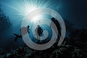 Underwater view on group of scuba divers with instructor in seawater