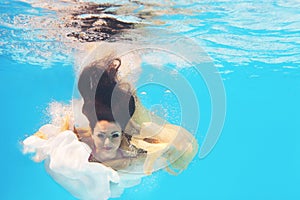 Underwater woman close up portrait