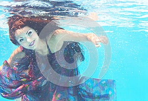 Underwater woman close up portrait