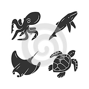 Underwater world glyph icons set. Swimming octopus, turtle, whale. Ocean animals, undersea wildlife. Zoology and marine