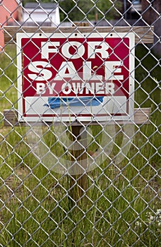 Undeveloped vacant lot with for sale sign