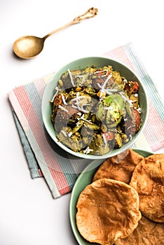 Undhiyu is a one pot vegetable casserole dish that is the hallmark of gujarati vegetarian cuisine