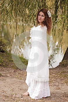 Undine, coming out of the river in thickets