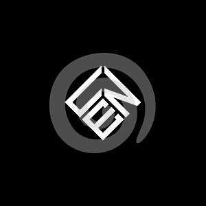 UNE letter logo design on black background. UNE creative initials letter logo concept. UNE letter design photo